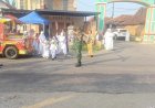 Anggota Koramil 0804/07 Karangrejo Bersama Anggota Polsek Karas Dukung Pengamanan Manasik Haji di Lapangan Desa Karas